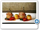 Pork medallion, boursin filled, pancetta, portwine sauce, spinach, oven baked Provencal potato